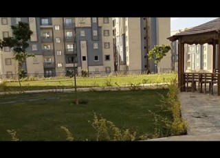  الفيو الأمامى والفيو الخلفى فى مشروع 557 عماره 390 فدان حدائق اكتوبر الإسكان الإجتماعى