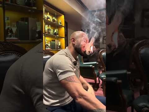 Andrew Tate Smoking A Cigar