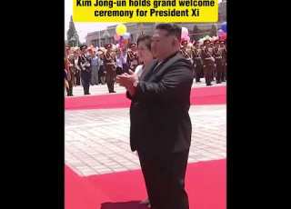  Kim Jong Un Holds Grand Welcome Ceremony For President Xi