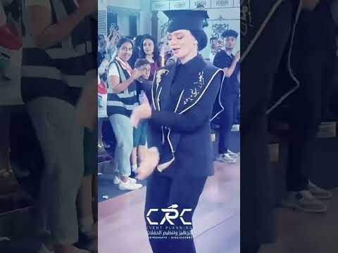 فتاة ترقص في حفل تخرجها باسيوط