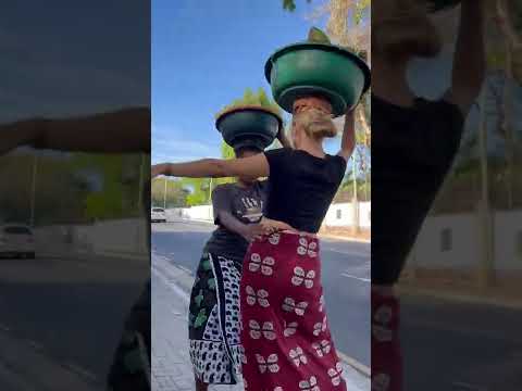 Tanzanian Girl Teaching Me To Balance With Buckets Of Fruits On Our Heads Leftandright