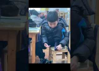  School Boy Calculating Answer By Using Hand And Feet Fingers