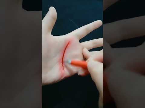 رسم خدعة الجرح على اليد