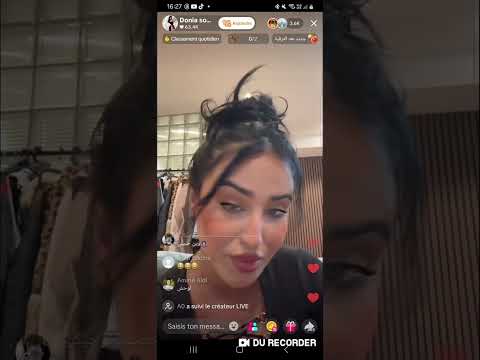 دنيا الصرماني لابسة لمشبك و توري في راس البزول