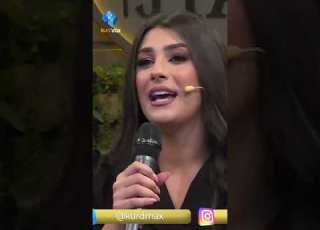 نیوەی گۆرانییەکەی بە پێکەنین گوتەوە بانو گۆرانی شیرینە سەوزەی هەڵبژاردووە و دەیڵێتەوە
