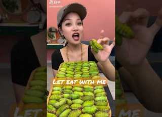  Beautiful Chinese Girl Eating Green Worms