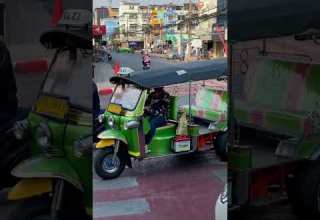 Green TukTuk In Bangkok Thailand