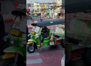 Green TukTuk In Bangkok Thailand