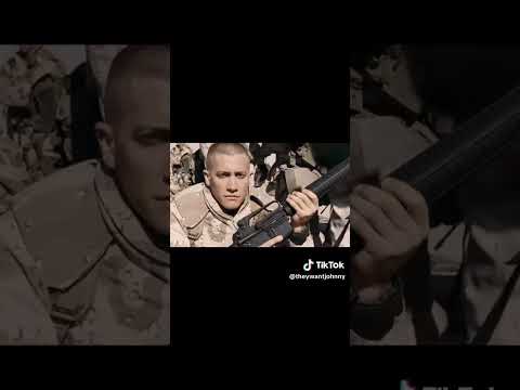 A Man Fires A Rifle For May Years