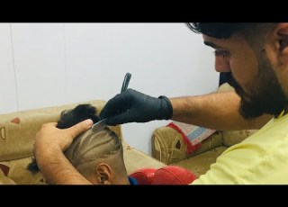 حلاق عراقي رسم ريشه على الشعر تعليم حلاقه حسين العالمي