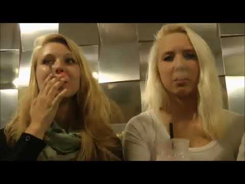 2 Smoking Girls In A Café SloMo