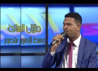 طلال الساتة وسط الزهور متصور