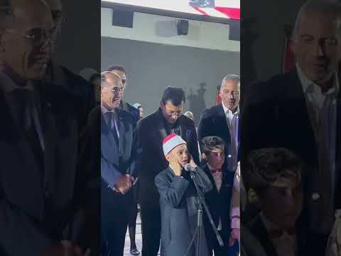 حاله من الخشوع والدهشه من وزير الشباب والرياضه بعد سماع القارئ عمر على فى افتتاحية الحفل