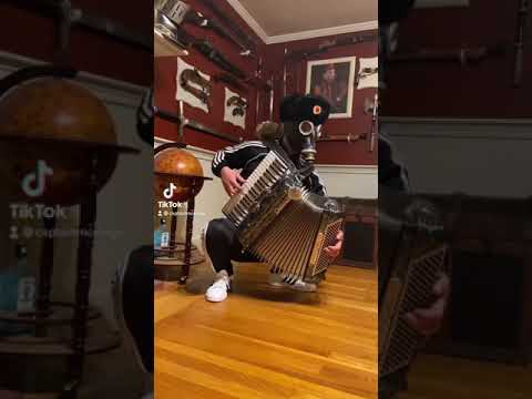 Squatting And Playing Moskau On Accordion Shorts Accordion