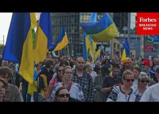  Germans Wave Flags To Demand End To Russia Ukraine War And Celebrate Ukrainian Independence