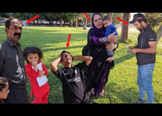 A Nomadic Woman Wanders With Her Children In The City And Parks Hoping To Find News Of Ali