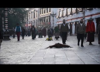 Pilgrims Pray In Tibet S Lhasa