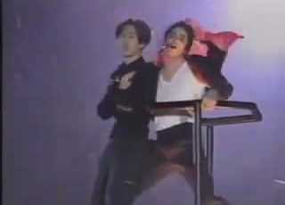 Korean Fan Jumps Onto Crane With Michael Jackson During Earth Song