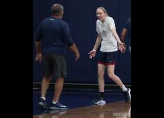  Paige Bueckers Playfully Arguing With Geno Auriemma