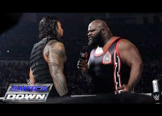 Roman Reigns Spears A Returning Mark Henry Through The Barricade SmackDown March 12 2015