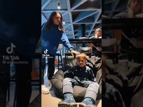 Her Sits On Kids Head