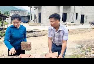 Tuyet Helps Police Officer Tuyen Clean Up The Area Where He S Preparing To Set Up His Tent