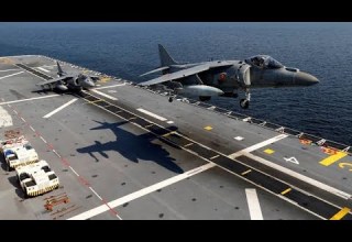 THE WONDERFUL SHIP WITH AN AIRPORT ON TOP OF IT PLANES LANDING AND TAKE OFF U S SUPER CARRIER THA