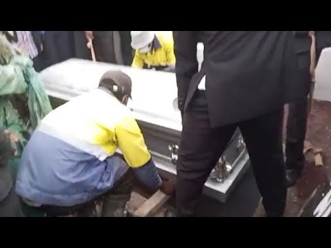 THE BODY OF CHAMPION KALELE AT THE CEMETERY REST IN PEACE CHAMPION