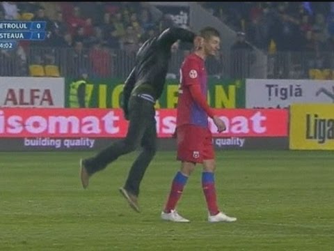 FOOTBALL VIOLENCE Romanian Fan Punches Steaua Bucharest Player FOOTBALL VIOLENCE Romanian Fan Punches Steaua Bucharest Player