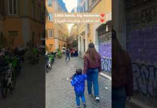 Hand In Hand With My Baby In Rome S Cozy Streets يدا بيد مع طفلي في شوارع روما الدافئة