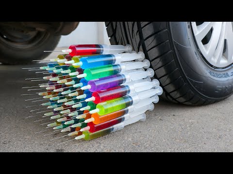 Experimento Jeringas VS Rueda De Coche Aplastando Cosas Crujientes Con El Coche