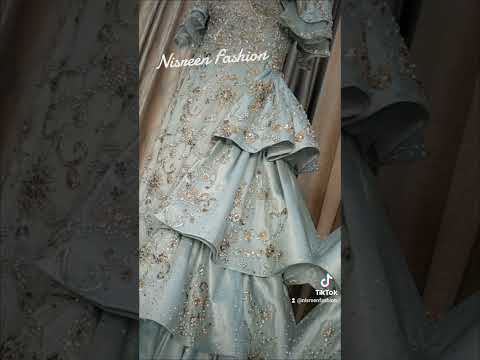 فستان زريكون جميل مع ذيل طبقات