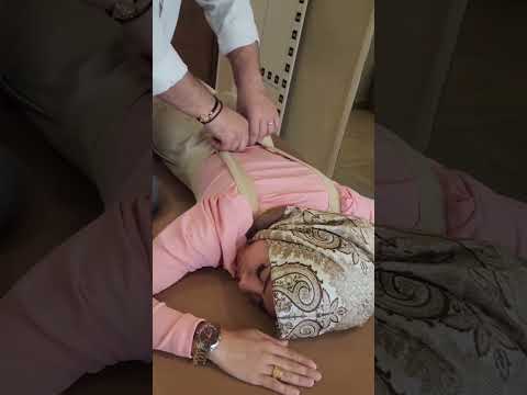 معالجة فتاة تعاني من ألم شديد بالرقبة و الظهر