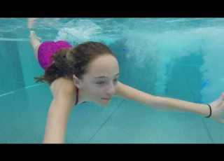 Carla Underwater Swimming With A Lot Of Snow