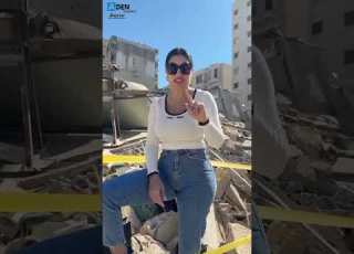  سيدة لبنانية تقف فوق ركام منزلها ومحلاتها التجارية المدمرةوتوجه رسائل تعبر عن الصمود والموقف السياسي