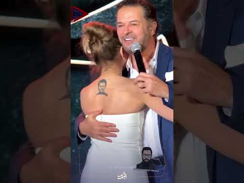 معجبة راغب علامة الأكثر وفاء تقبيل يده ووشمت صورته ع جسدها تعبيرا عن حبها وهو يعلق أعتز فيها