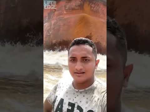 Tiny Boat In Front Of Cargo Ship Shorts Tiny Boat In Front Of Cargo Ship Shorts