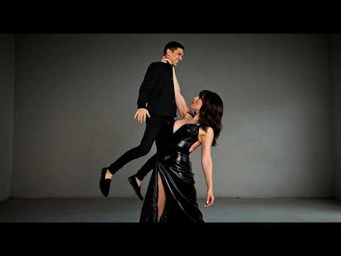 GOTHIC AND TALL Tall Woman Lifts Short Man