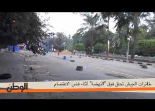 طائرات الجيش تحلق فوق النهضة أثناء فض الاعتصام