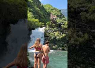 Two Beautiful Girls Jumping Off The Waterfall Cliffjumping Travel