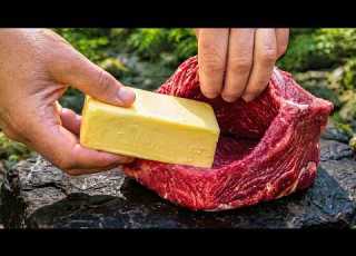 Stuffing A Giant Steak With Homemade Butter In The Forest