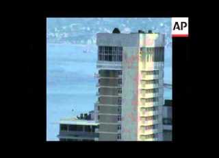  SYND 13 12 75 LEBANON MUSLIM FORCES ATTACKING CHRISTIAN STRONGHOLD IN HOLIDAY INN HOTEL IN BEIRUT