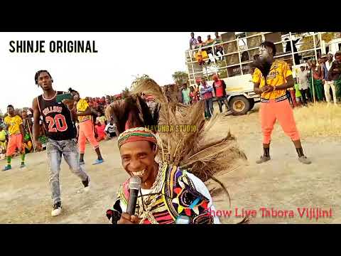 SHINJE ORIGINAL Amchana BHUDAGALA Na MADEBE JINASA Katika Show Live MAYUNGA STUDIO TABORA 2023 SHINJE ORIGINAL Amchana BHUDAGALA Na MADEBE JINASA Katika Show Live MAYUNGA STUDIO TABORA 2023