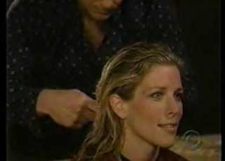 WOMAN GETTING HAIRCUT IN MOVIE