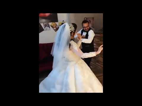 عريس وعروسة بيرقصو على مهرجان يا ام شعر حرير