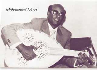  محمد الأمين عوك بالعود