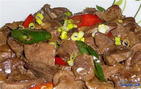 طريقة عمل الكبد والقوانص في صلصة الطماطم مع الأرز