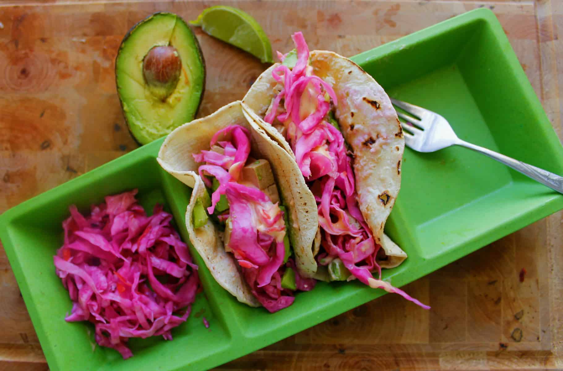 At the Immigrant's Table Spicy tofu tacos, cabbage & avocado