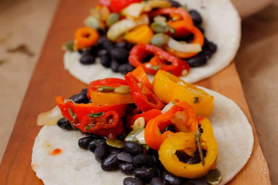 At the Immigrant's Table Black bean tacos with sweet peppers