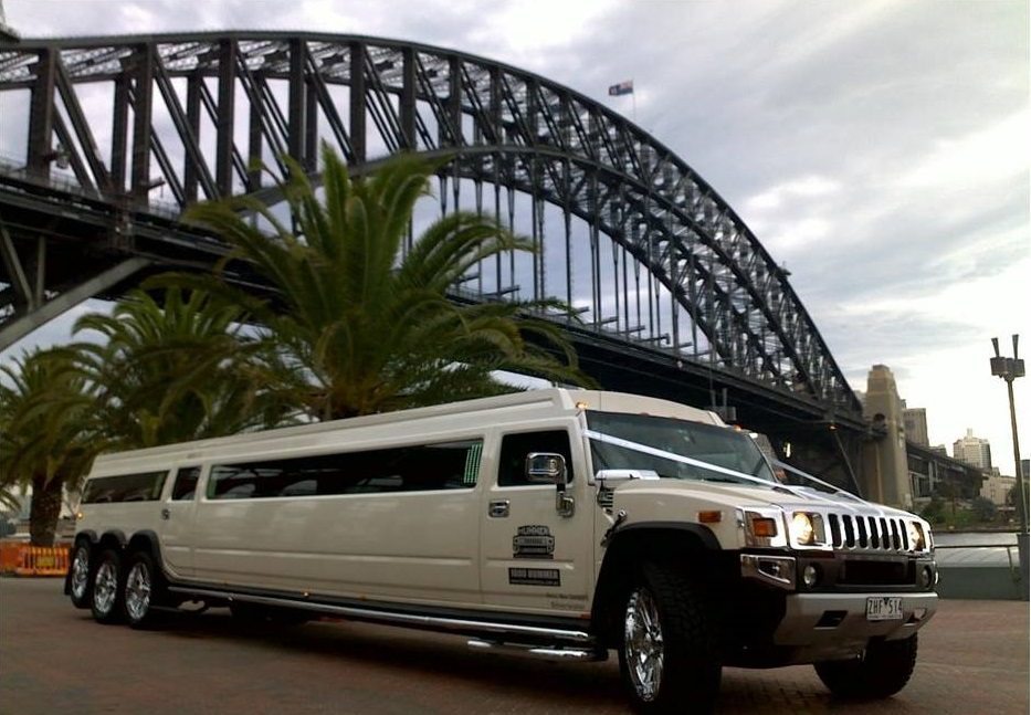 White and Pink 24 Seater Hummers Impressive Limousines